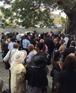 Gathering outside church after funeral